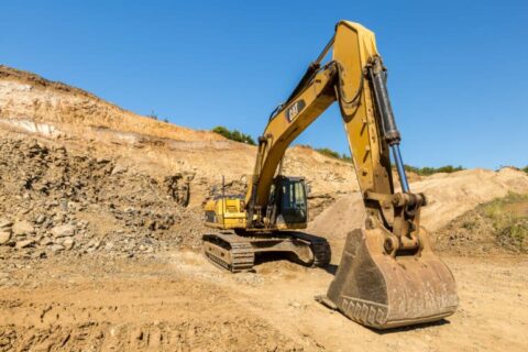 Kennedy Haulage yellow excavator in quarry